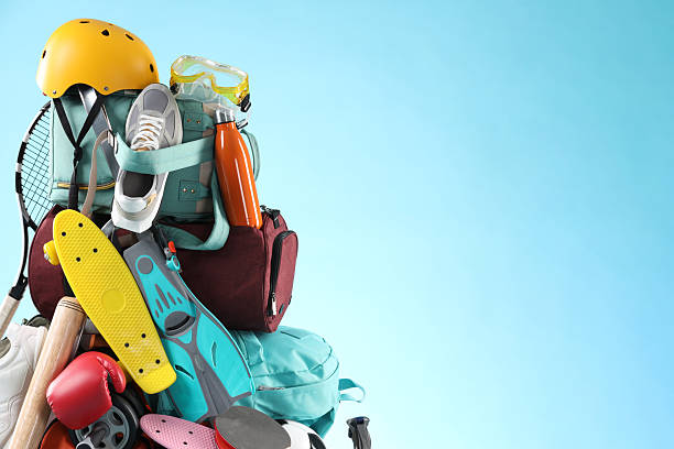istock Many different sports equipment on light blue background 2250586984