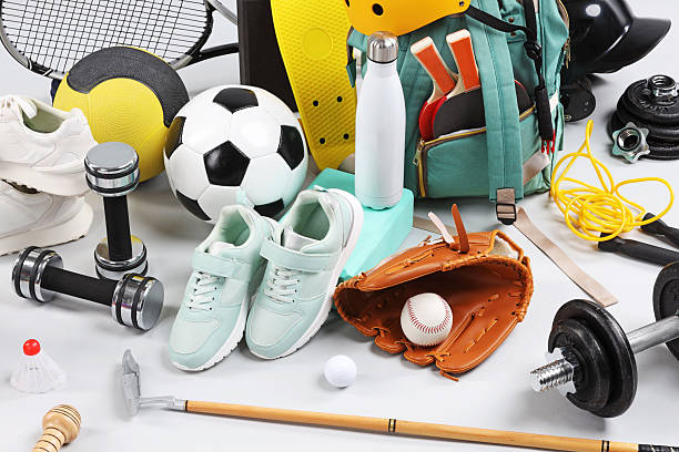 istock Many different sports equipment on light grey background 2250587006
