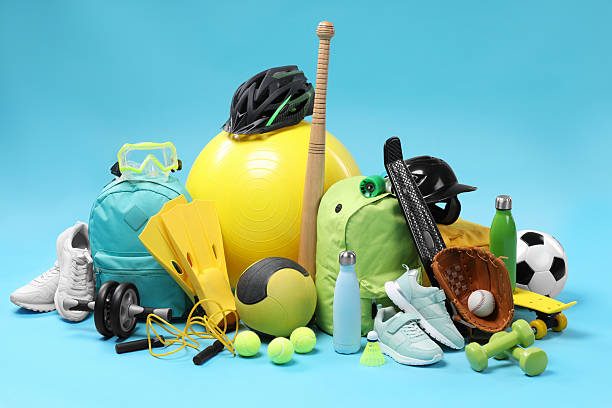 istock Many different sports equipment on light blue background 2250587032