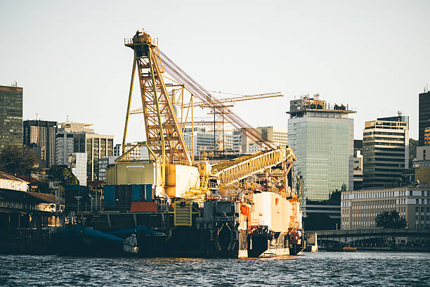 London, United Kingdom - June 25, 2024: London Vauxhall district, modern residential buildings along the River Thames, working site on the river
