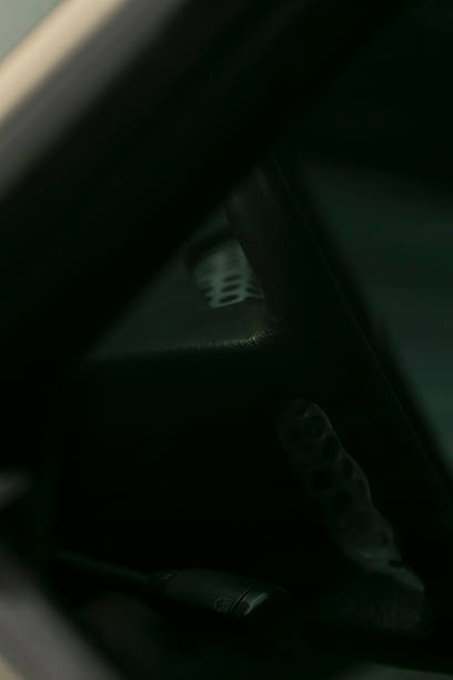 Intimate shot of vehicle interior with urban elements present