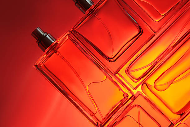 Background image with bottles filled with colorful liquids