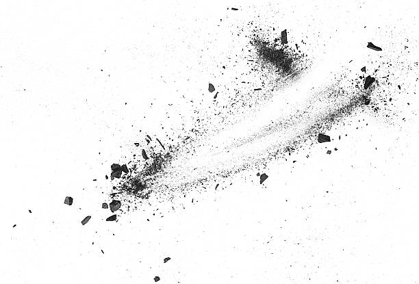 istock Pieces of broken charcoal scattered on a white background, top view. Charcoal particles. 2250593579