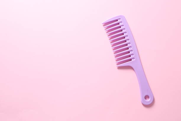 Hair comb on a colored background
