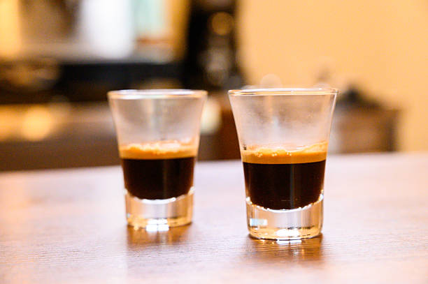 istock Two espresso shots on counter preparing for morning caffeine 2250601052