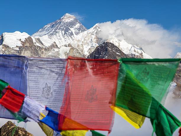 istock Mount Everest Lhotse peak buddhist prayer flags mountain 2250602495