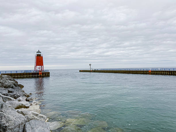 istock Red Lighthouse at the End of the Pier 2250602511