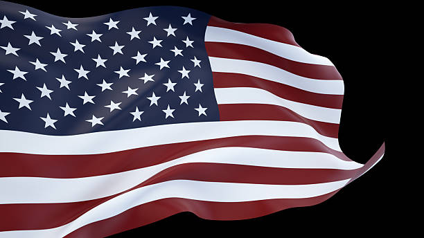 istock A waving American flag. Black background. 2250606115