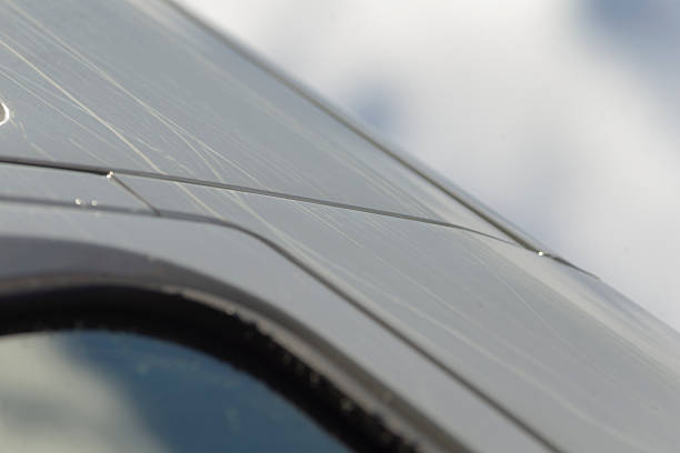 Industrial environment showcasing vehicle side panel repair details