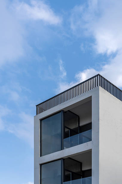 istock A house with white walls and windows on a sunny day 2250615995