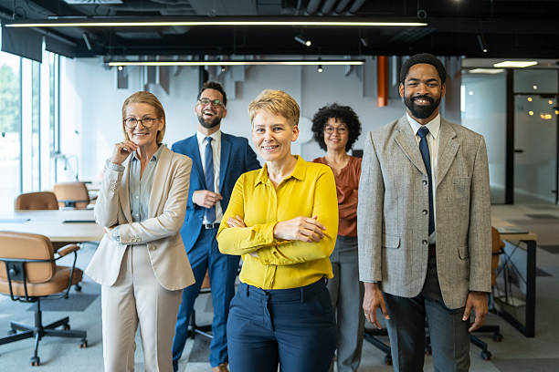 istock Successful business team smiling together in modern office 2250616241