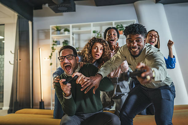 istock Diverse friends enjoying video game competition together 2250617013