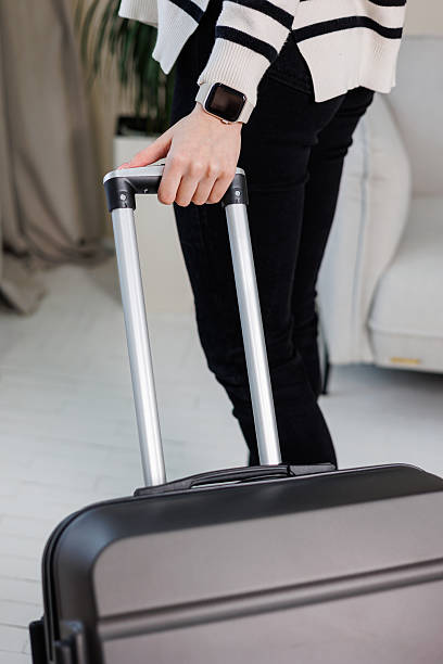 istock Gray beautiful suitcase for tourist trips. High-quality gray suitcase for things. 2250617878