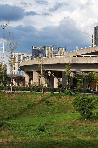 istock Concrete structure and asphalt road space under the overpass in the city 2250618288