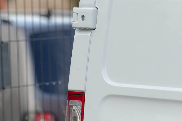 istock Van back details, Rear vehicle corner featuring paint and scratches 2250620470