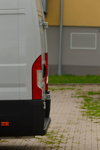 istock Close proximity parking area with wet brick surface and cautionary visual cues 2250622710