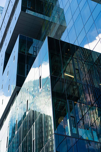 istock Modern glass background. Glass exterior background. Architecture. Building exterior architecture. Building background. Glass building. Architectural detail. Background of architecture 2250626175