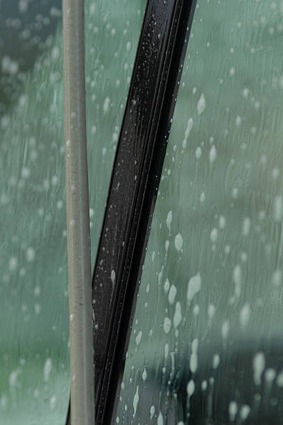 istock Professional vehicle window scrubbing with foam and precise technique 2250627540