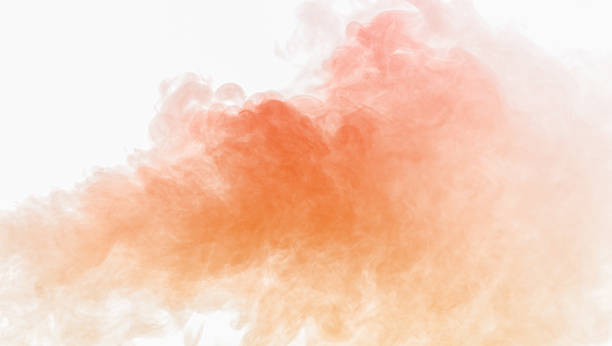 istock Orange dust cloud isolated on white background, realistic powder explosion texture for design overlay, sand or smoke particle effect, abstract motion with warm cinematic atmosphere. 2250630028