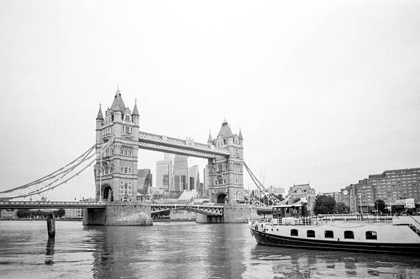 istock Tower bridge standing tall over river thames in london, uk 2250630098