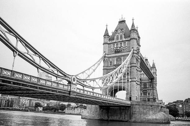 istock Tower bridge standing majestically over thames river in monochrome 2250630103