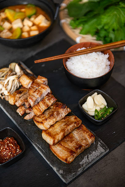 istock Authentic Korean Bossam Platter with Steamed Rice and Accompaniments 2250632062