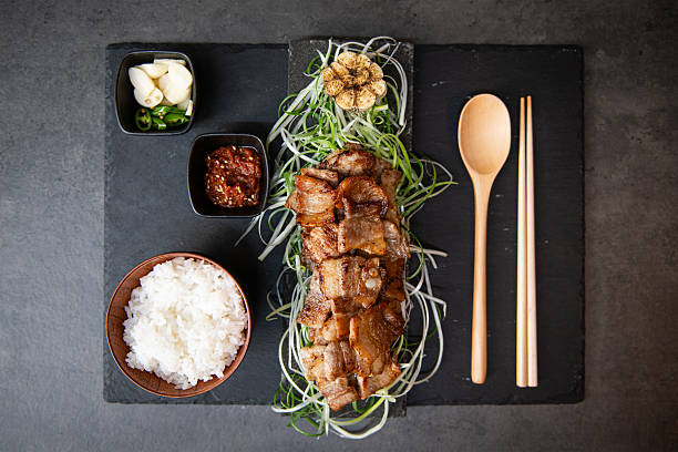 istock Authentic Korean Bossam Platter with Steamed Rice and Accompaniments 2250632072