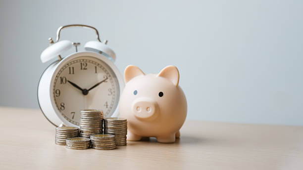 istock bill, reminder, due, recurring, payment, budgeting, notifications, calendar, schedule, A piggy bank, stacked coins, and a clock represent budgeting, due payments, and financial reminders. 2250635105