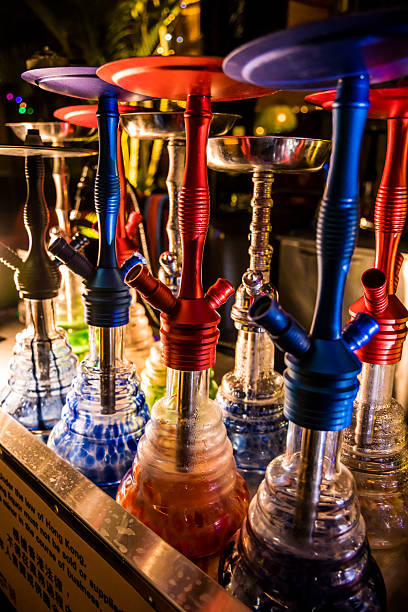 istock colorful hookahs with glowing liquid bases 2250636091