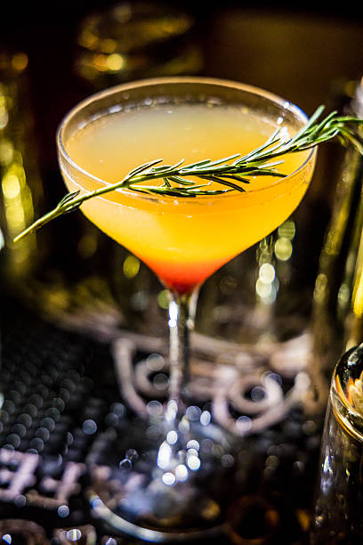 istock layered cocktail with rosemary and elegant lighting 2250636102