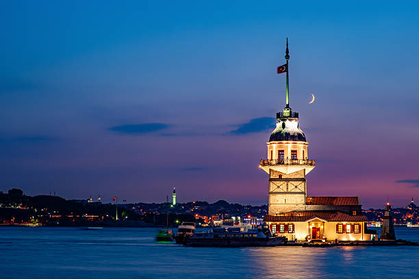 istock The Maiden's Tower illumination and crescent moon on the Bosphorus at night 2250637747