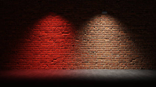 istock Brick Wall Background, Rough Concrete With Glowing Red White Lights 2250643313