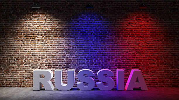 Brown brick wall background with spot lighting effect. Blue, red