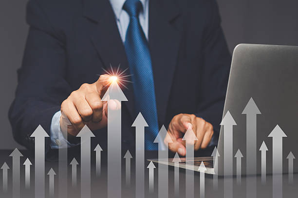 istock Business growth strategy with hand touching rising arrow. 2250650635