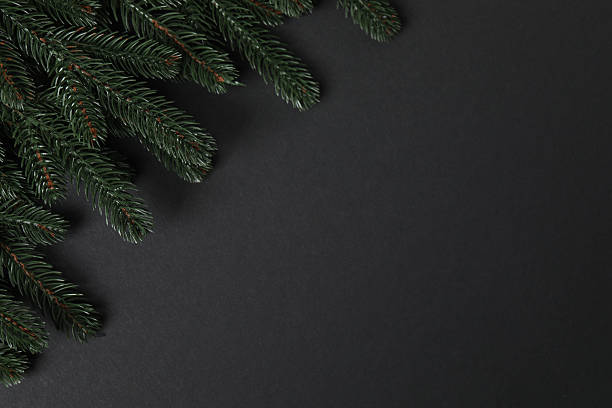 istock Christmas gift. Top view of image on black background with space for decoration. 2250652108