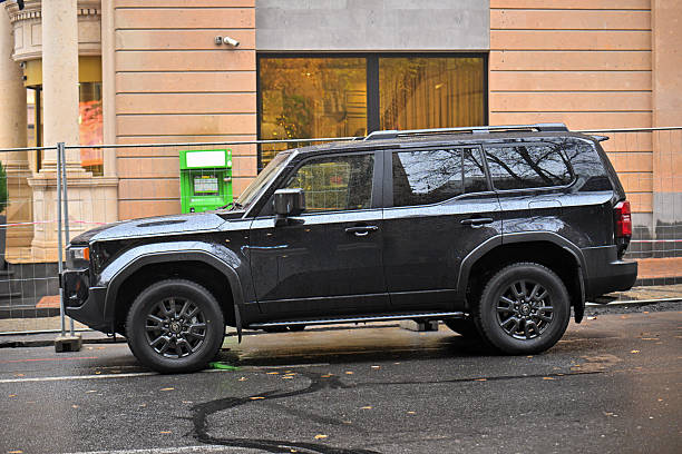 Sweden. Uppsala. 08.12.2024. Close-up view of blue INEOS Grenadier off-road vehicle showcasing its rugged design.