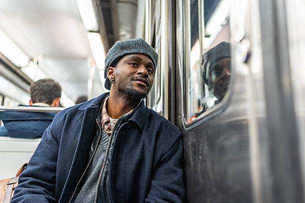 istock Thoughtful man commuting on urban subway train 2250657687