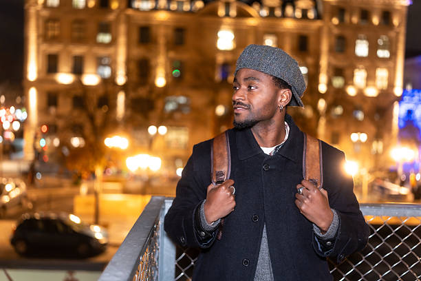 istock Young man traveling through paris city at night 2250658750