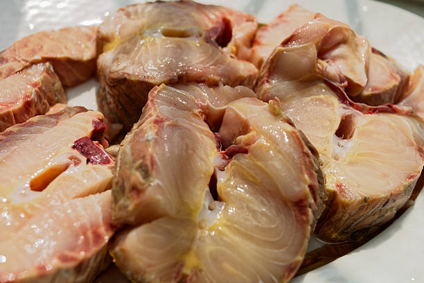 Fresh pork shoulder steaks, thick and juicy, perfect for grilling or slow cooking