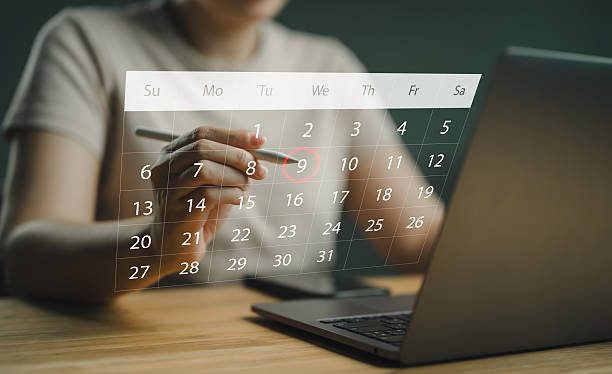 istock Calendar on the virtual screen interface, Businessman manages time for effective work, Highlight appointment reminders and meeting agenda on the calendar. Time management concept. Actions plans. 2250663720