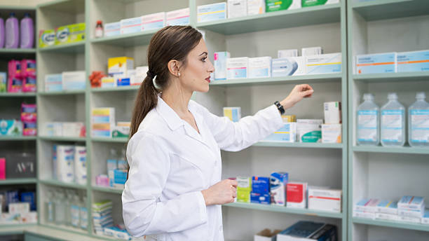 istock Pharmacist checking medicine stock in pharmacy 2250665651