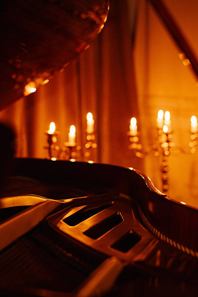 istock Grand piano with elegant candlelight ambiance creating a warm and inviting atmosphere 2250667837