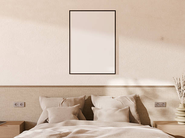 istock Modern minimalist bedroom with a blank frame mockup hanging on the wall. 2250668697