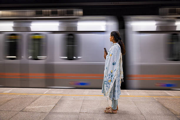 istock Woman Waiting on Metro Platform — Jaipur, India 2250669343