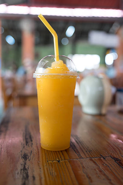 istock Orange smoothie in a glass 2250674641