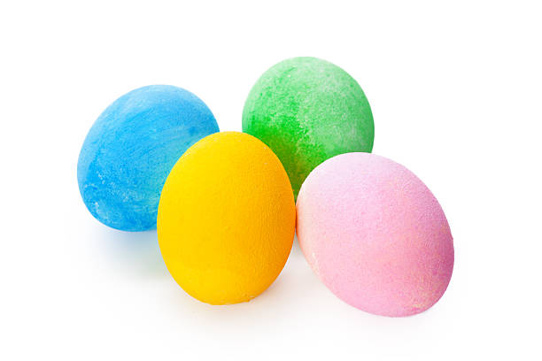 Brightly colored candy eggs sit together, perfect for Easter or spring-themed events.