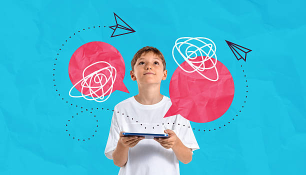 istock Kid holding tablet surrounded by abstract thought bubbles and pa 2250677563