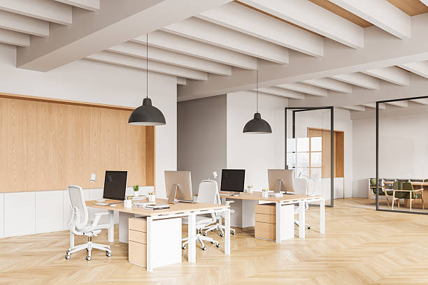istock Modern open space office interior with wooden elements, ergonomic furniture and minimalist design style, showcasing collaborative workspace concept. 3D Rendering 2250677787