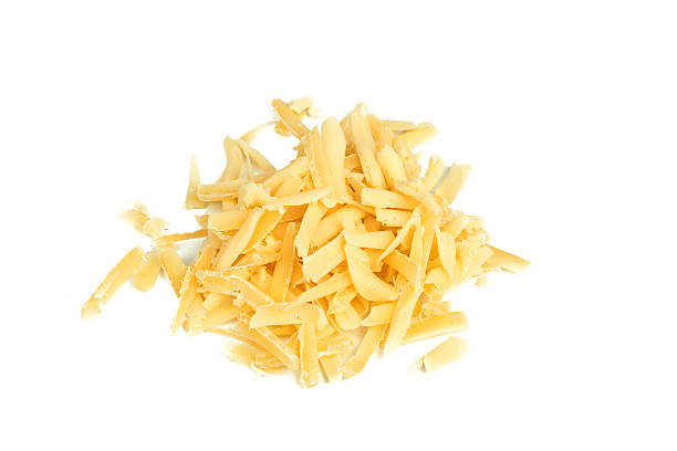 istock Shredded cheese on a white surface ready for cooking or toppings 2250678303