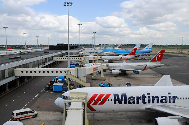 Haarlemmermeer, Netherlands - May 19, 2008. Outdoor scene showing jet airliners parked at Schiphol airport.